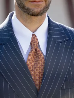 Cravate en laine orange à motifs rétro