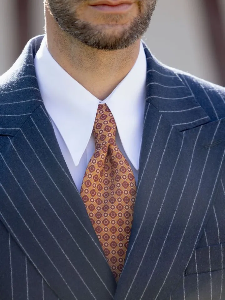 Cravate en laine orange à motifs rétro