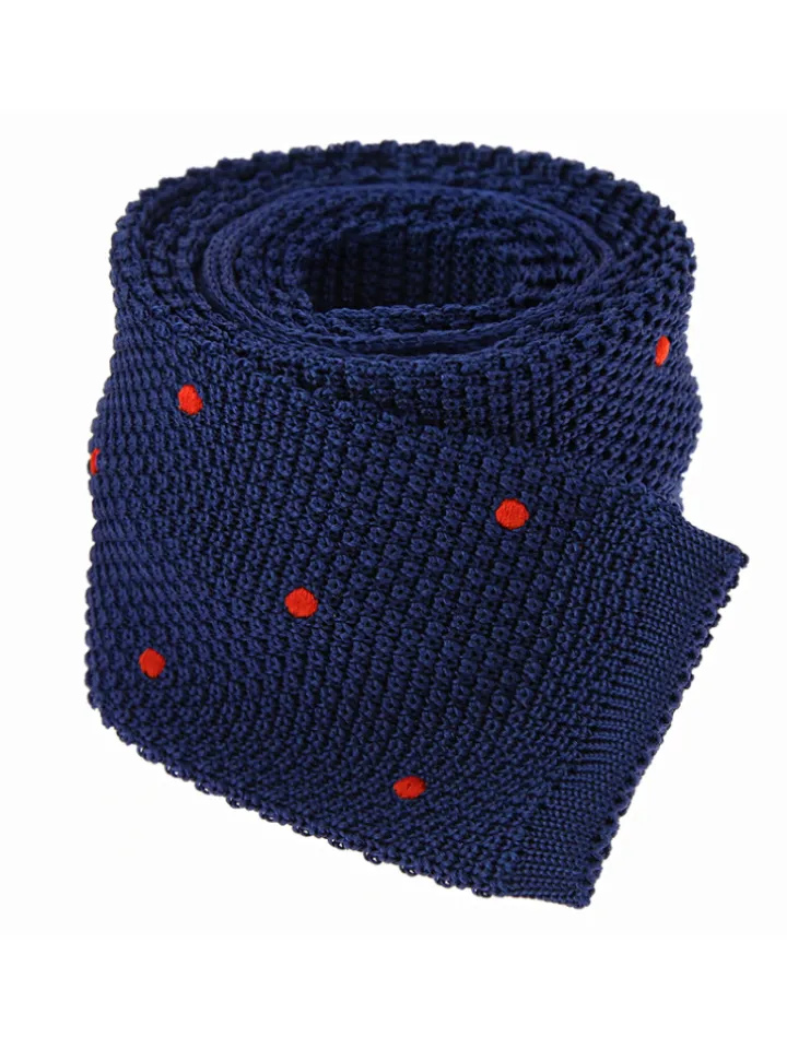 Cravate tricot en soie bleue à pois orange